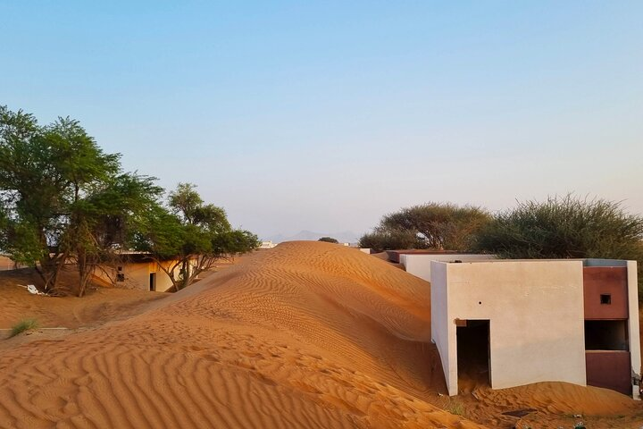 Experience the haunting beauty of the Ghost Village in Al Madam Desert perfectly combined with adrenaline-pumping activities like dune bashing sandboarding and a delightful BBQ dinner under the stars.